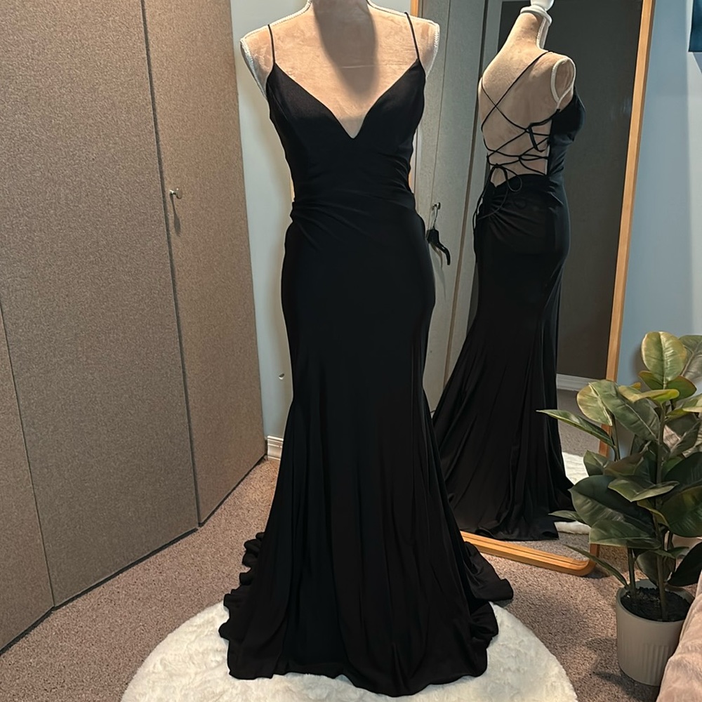 Worn once Sherri Hill dress. Had altered for my height, 5’3 and was still long.